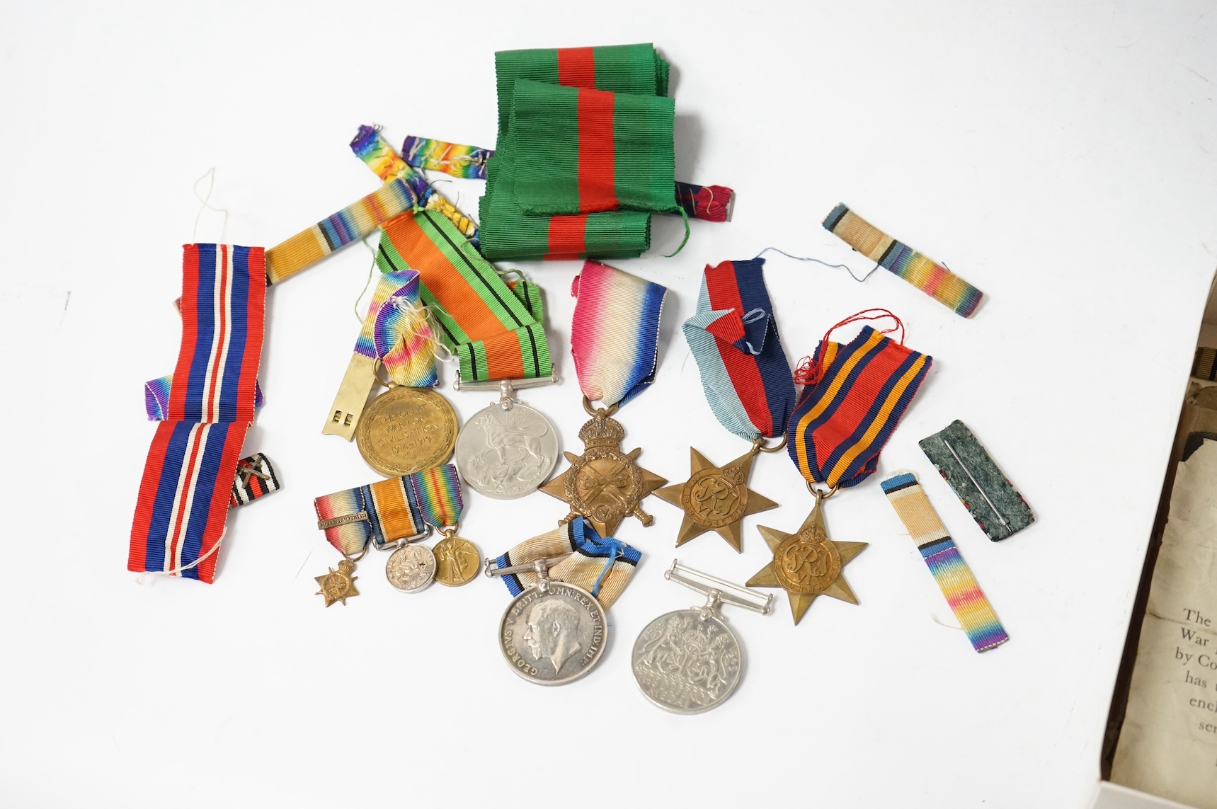 A collection of military medals, shoulder titles, whistles, etc. including; a WWI medal trio to 19698 PTE. T. Campbell. 10-CAN. INF., a miniature trio, four WWII medals; the Burma Star, the 1939-1945 Star, the Defence Me